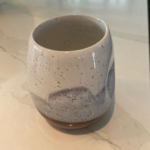 Pottery handle less mug, beautiful.